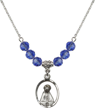 18" Rhodium Plated Necklace with 4mm Sapphire Crystal Beads featuring a Sterling Silver Madonna Medal.