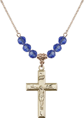 18" Hamilton Gold Plated Necklace with 4mm Sapphire Crystal Beads featuring a 14kt Gold Filled Crucifix Medal.