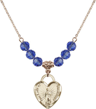 18" Hamilton Gold Plated Necklace with 4mm Sapphire Crystal Beads featuring a 14kt Gold Filled Our Lady Guadalupe Heart / Recuerdo Medal.