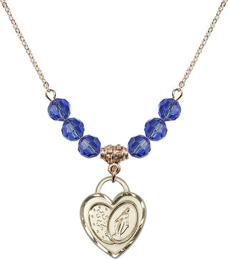 18" Hamilton Gold Plated Necklace with 4mm Sapphire Crystal Beads featuring a 14kt Gold Filled Miraculous Heart Medal.