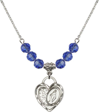 18" Rhodium Plated Necklace with 4mm Sapphire Crystal Beads featuring a Sterling Silver Miraculous Heart Medal.
