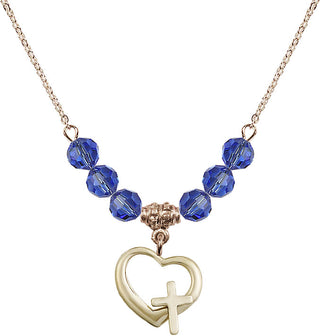18" Hamilton Gold Plated Necklace with 4mm Sapphire Crystal Beads featuring a 14kt Gold Filled Heart / Cross Medal.