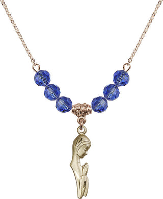 18" Hamilton Gold Plated Necklace with 4mm Sapphire Crystal Beads featuring a 14kt Gold Filled Madonna Medal.