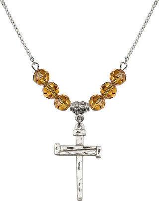 18" Rhodium Plated Necklace with 4mm Topaz Crystal Beads featuring a Sterling Silver Nail Cross Medal.