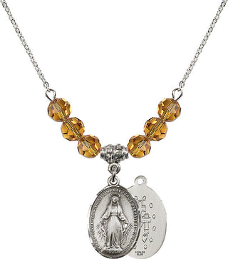 18" Rhodium Plated Necklace with 4mm Topaz Crystal Beads featuring a Sterling Silver Miraculous Medal.