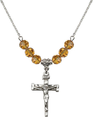 18" Rhodium Plated Necklace with 4mm Topaz Crystal Beads featuring a Sterling Silver Nail Crucifix Medal.