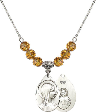 18" Rhodium Plated Necklace with 4mm Topaz Crystal Beads featuring a Sterling Silver Sorrowful Mother Medal.