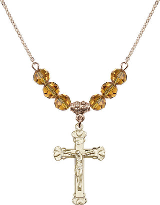 18" Hamilton Gold Plated Necklace with 4mm Topaz Crystal Beads featuring a 14kt Gold Filled Crucifix Medal.