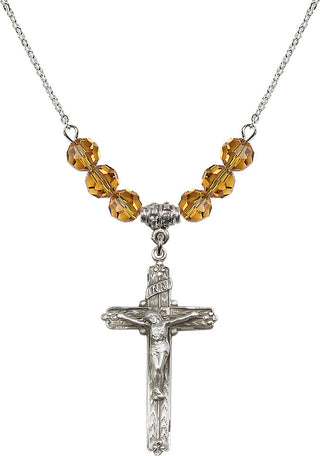 18" Rhodium Plated Necklace with 4mm Topaz Crystal Beads featuring a Sterling Silver Crucifix Medal.