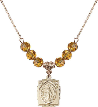 18" Hamilton Gold Plated Necklace with 4mm Topaz Crystal Beads featuring a 14kt Gold Filled Miraculous Medal. Engraved Catholic Saint Jewelry