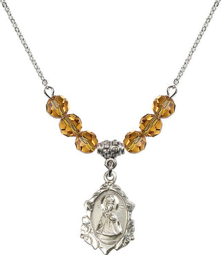 18" Rhodium Plated Necklace with 4mm Topaz Crystal Beads featuring a Sterling Silver Infant of Prague Medal. Engraved Catholic Saint Jewelry