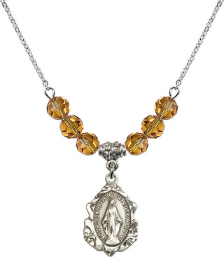 18" Rhodium Plated Necklace with 4mm Topaz Crystal Beads featuring a Sterling Silver Miraculous Medal. Engraved Catholic Saint Jewelry