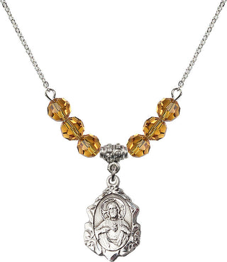 18" Rhodium Plated Necklace with 4mm Topaz Crystal Beads featuring a Sterling Silver Scapular Medal.