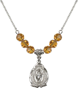 18" Rhodium Plated Necklace with 4mm Topaz Crystal Beads featuring a Sterling Silver Miraculous Medal.