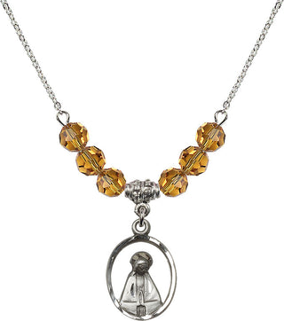 18" Rhodium Plated Necklace with 4mm Topaz Crystal Beads featuring a Sterling Silver Madonna Medal.