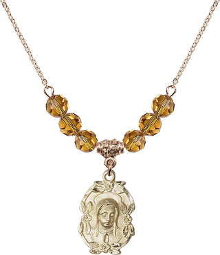 18" Hamilton Gold Plated Necklace with 4mm Topaz Crystal Beads featuring a 14kt Gold Filled Madonna Medal.