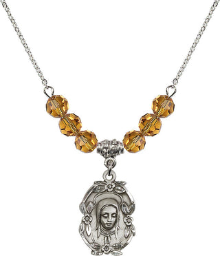18" Rhodium Plated Necklace with 4mm Topaz Crystal Beads featuring a Sterling Silver Madonna Medal.
