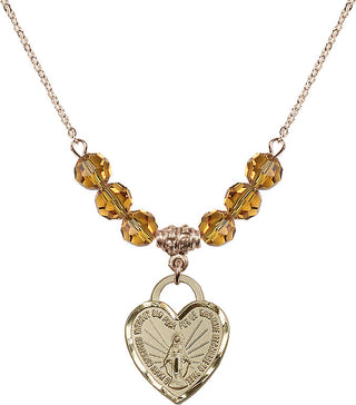 18" Hamilton Gold Plated Necklace with 4mm Topaz Crystal Beads featuring a 14kt Gold Filled Miraculous Heart Medal. Engraved Catholic Saint Jewelry