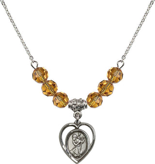 18" Rhodium Plated Necklace with 4mm Topaz Crystal Beads featuring a Sterling Silver Saint Christopher Medal.