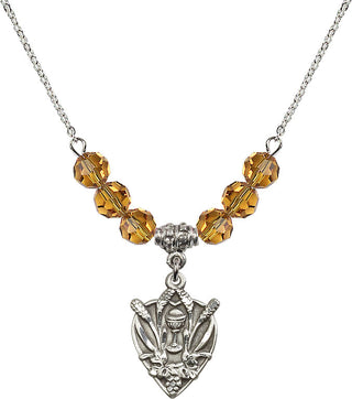 18" Rhodium Plated Necklace with 4mm Topaz Crystal Beads featuring a Sterling Silver Communion Medal.