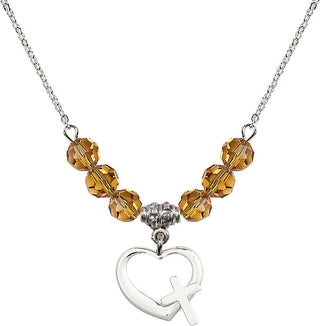 18" Rhodium Plated Necklace with 4mm Topaz Crystal Beads featuring a Sterling Silver Heart / Cross Medal.