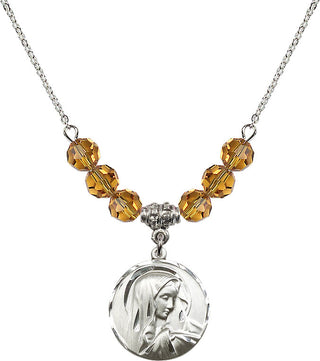 18" Rhodium Plated Necklace with 4mm Topaz Crystal Beads featuring a Sterling Silver Sorrowful Mother Medal.