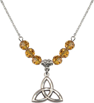 18" Rhodium Plated Necklace with 4mm Topaz Crystal Beads featuring a Sterling Silver Trinity Irish Knot Medal.