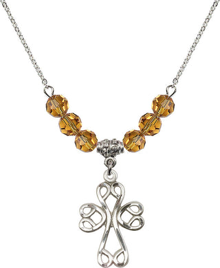 18" Rhodium Plated Necklace with 4mm Topaz Crystal Beads featuring a Sterling Silver Scroll Cross Medal.