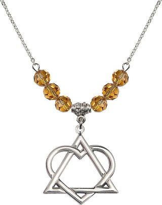 18" Rhodium Plated Necklace with 4mm Topaz Crystal Beads featuring a Sterling Silver Adoption Heart Medal.