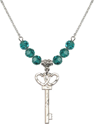 18" Rhodium Plated Necklace with 4mm Zircon Crystal Beads featuring a Sterling Silver Small Key w/Double Hearts Medal.