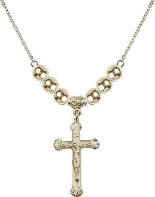 18" Hamilton Gold Plated Necklace with 6mm 14kt Gold Filled Beads featuring a 14kt Gold Filled Crucifix Medal.