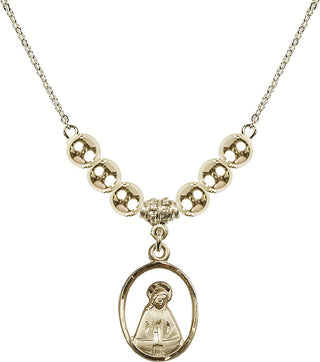 18" Hamilton Gold Plated Necklace with 6mm 14kt Gold Filled Beads featuring a 14kt Gold Filled Madonna Medal.