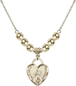 18" Hamilton Gold Plated Necklace with 6mm 14kt Gold Filled Beads featuring a 14kt Gold Filled Our Lady Guadalupe Heart / Recuerdo Medal.