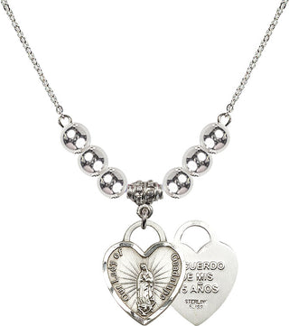 18" Rhodium Plated Necklace with 6mm Sterling Silver Beads featuring a Sterling Silver Our Lady Guadalupe Heart / Recuerdo Medal.