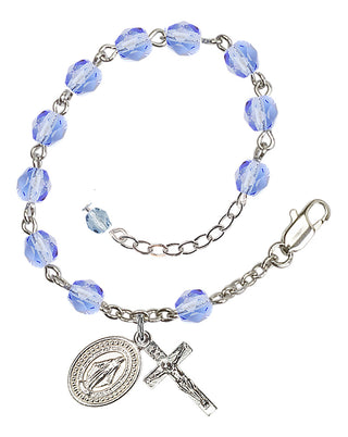 Adjustable Silver Plated 6mm Fire Polished Rosary Bracelet in Light Sapphire