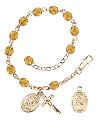 Adjustable Gold Plated 6mm Fire Polished Rosary Bracelet in Topaz