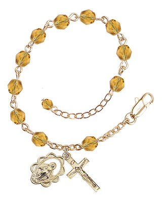 Adjustable Gold Plated 6mm Fire Polished Rosary Bracelet in Topaz