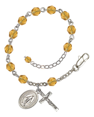 Adjustable Silver Plated 6mm Fire Polished Rosary Bracelet in Topaz