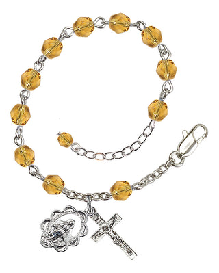 Adjustable Silver Plated 6mm Fire Polished Rosary Bracelet in Topaz