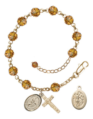 Adjustable 14 Karat Gold-Filled 6mm Austrian Crystal Saint Sebastian/Tennis Rosary Bracelet in Topaz