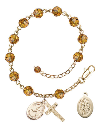 Adjustable 14 Karat Gold 6mm Austrian Crystal Saint Sebastian/Track & Field Rosary Bracelet in Topaz