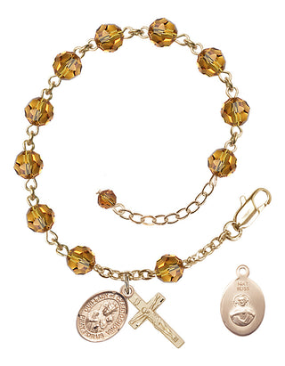 Adjustable 14 Karat Gold 6mm Austrian Crystal Our Lady of Czestochowa Rosary Bracelet in Topaz