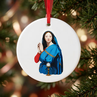 Virgin Mary Adoring the Host Ceramic Ornament hanging on a Christmas tree