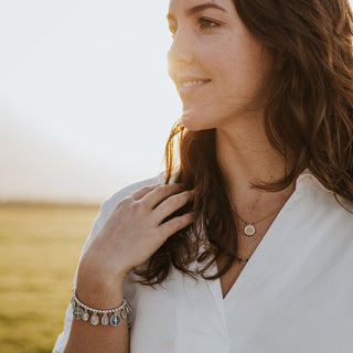 Woman wearing the Glory Saints & Angels Bracelet