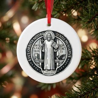 St. Benedict Medal Ceramic Ornament hanging on a Christmas tree