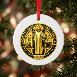 Gold St. Benedict Medal Ceramic Ornament hanging on a Christmas tree