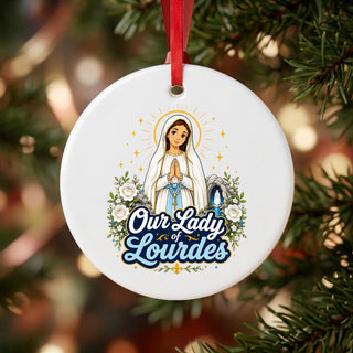 Our Lady of Lourdes Ceramic Ornament hanging on a Christmas tree