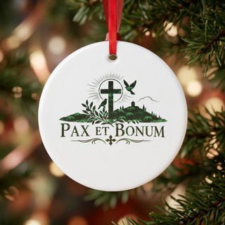 Pax et Bonum Botanical Cross Ceramic Ornament hanging on a Christmas tree