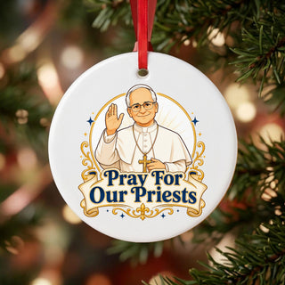 Pray for Our Priests Ceramic Ornament hanging on a Christmas tree