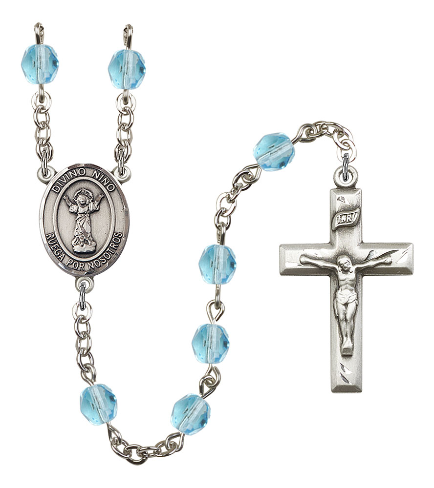 The charm features a O/L the Undoer of Knots medal. Silver Plate Rosary Bracelet features 6mm Sapphire Fire Polished beads The Crucifix measures 5/8 x 1/4